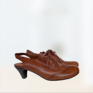 Kenneth Cole, women’s leather heeled mules, “Gentle Souls”
